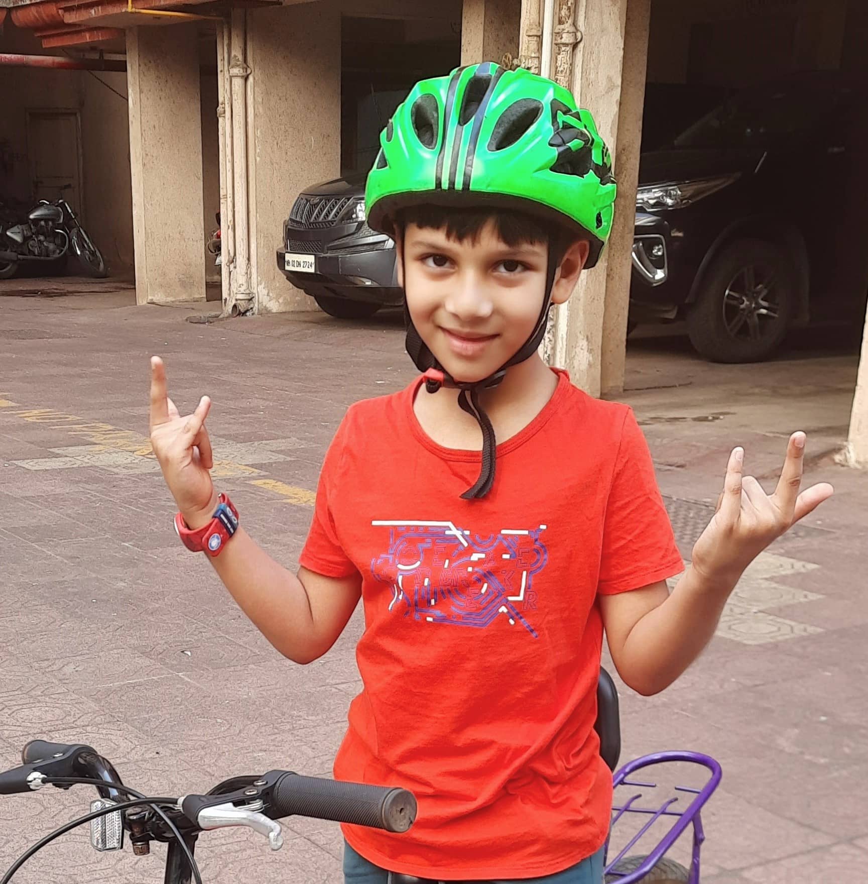 Testimonial image of a boy smiling with cycle